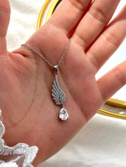 "Seraphic Spark" Angel Wing Pendant with Teardrop Crystal