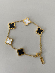Reversible Clover Charm Bracelet | Gold-Plated Chain with Black & White Enamel Floral Motifs