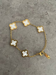 Reversible Clover Charm Bracelet | Gold-Plated Chain with Black & White Enamel Floral Motifs