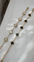 Reversible Clover Charm Bracelet | Gold-Plated Chain with Black & White Enamel Floral Motifs