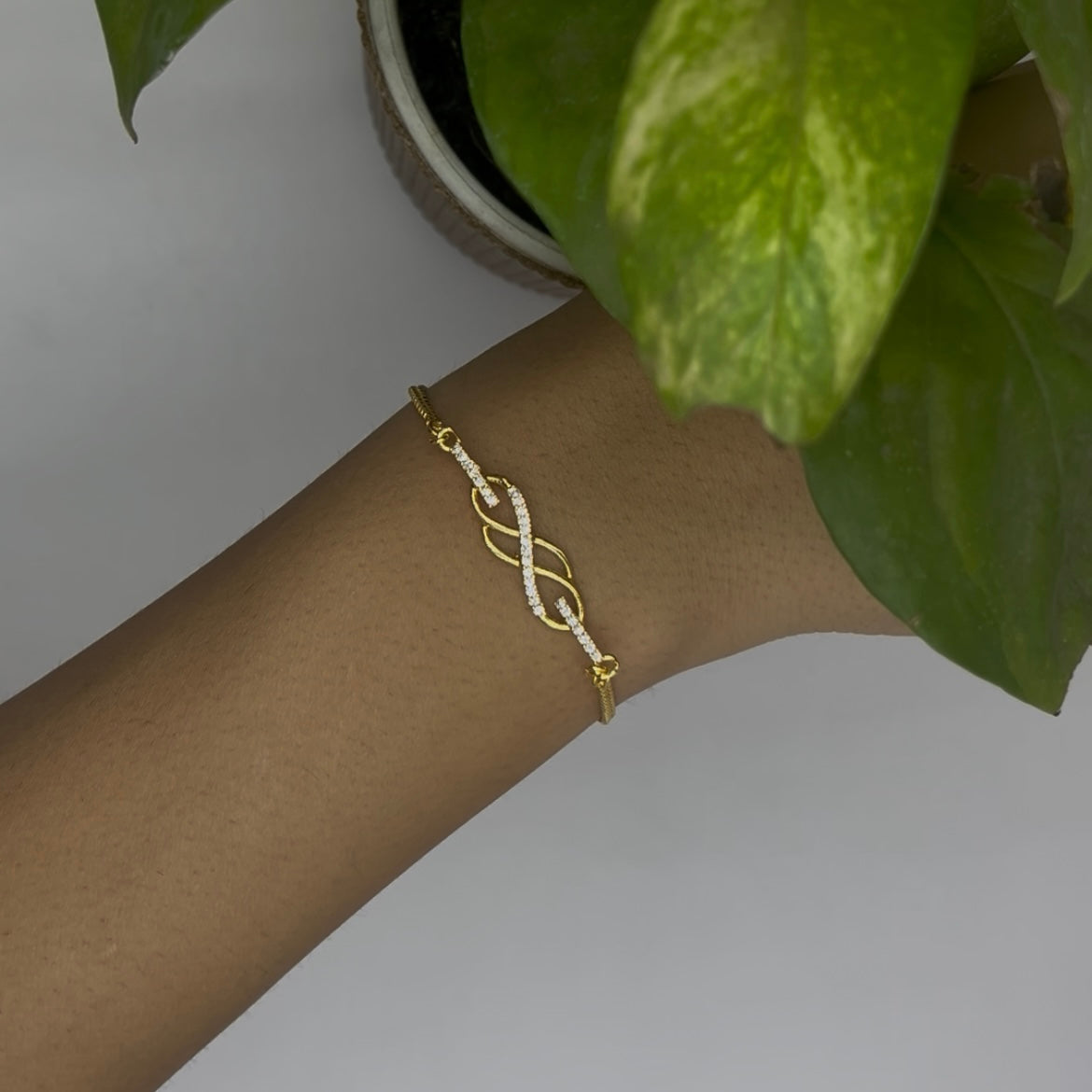 Dazzling Infinity Symbol Bracelet with CZ Accents | 1g Gold Plated