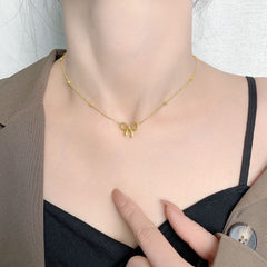 Golden Grace Anklet | Delicate Bow Charm with Beaded Chain Accent