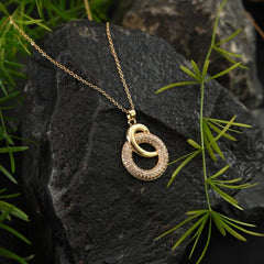 Eternal Radiance| Interlocked Circle Pendant in Gold with Pavé Crystals